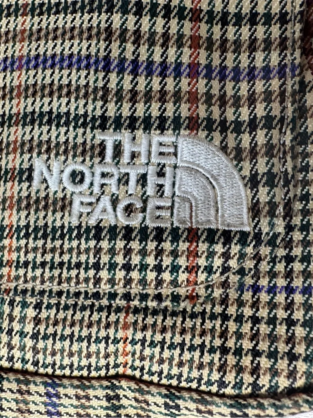 The North Face compact messenger